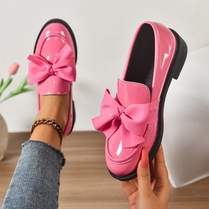 Women's pink bow loafers with platform sole