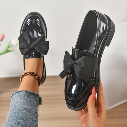 Women's pink bow loafers with platform sole