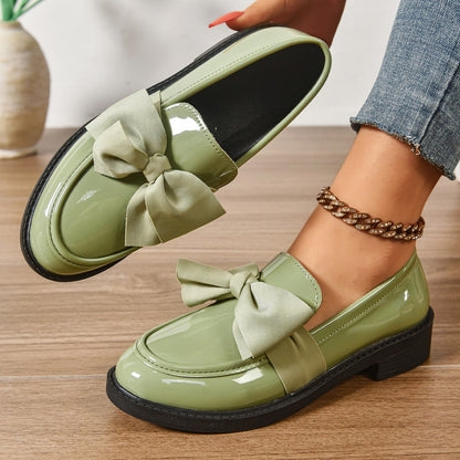 Women's pink bow loafers with platform sole