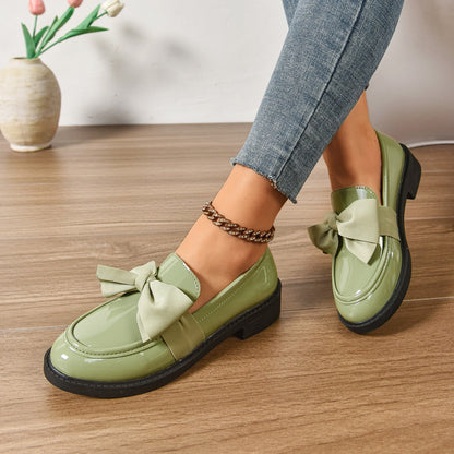Women's pink bow loafers with platform sole
