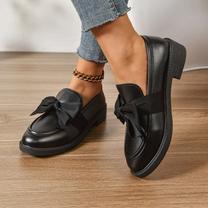 Women's pink bow loafers with platform sole