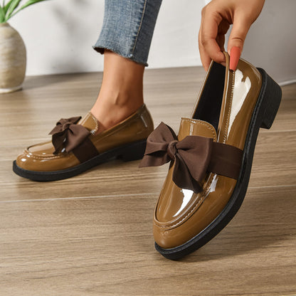 Women's pink bow loafers with platform sole