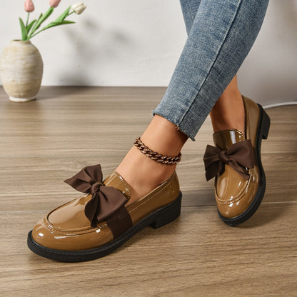 Women's pink bow loafers with platform sole