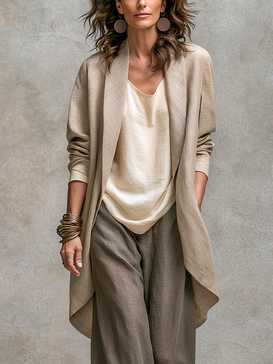 Woman wearing taupe three-piece wide leg pant suit set