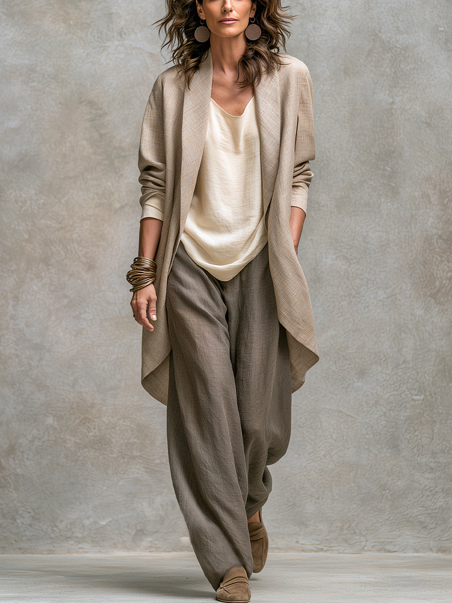 Woman wearing taupe three-piece wide leg pant suit set