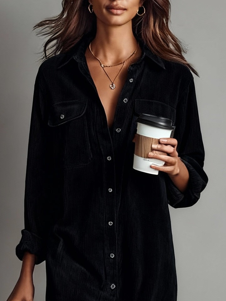 Woman wearing a relaxed midi shirt dress with pockets