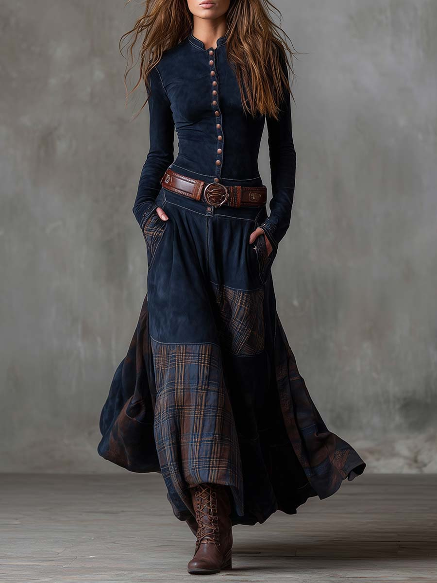 Woman wearing navy patchwork maxi dress with matching belt