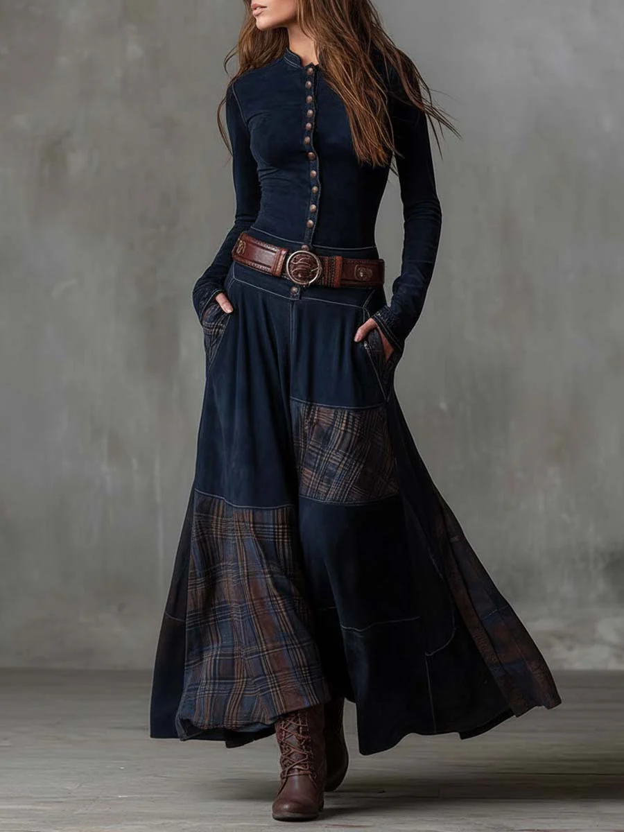 Woman wearing navy patchwork maxi dress with matching belt