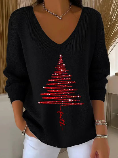 Woman wearing V-neck Christmas sweater with festive print