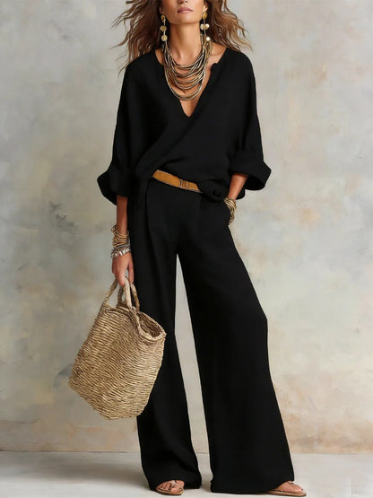 Woman wearing two piece set with wide leg pants