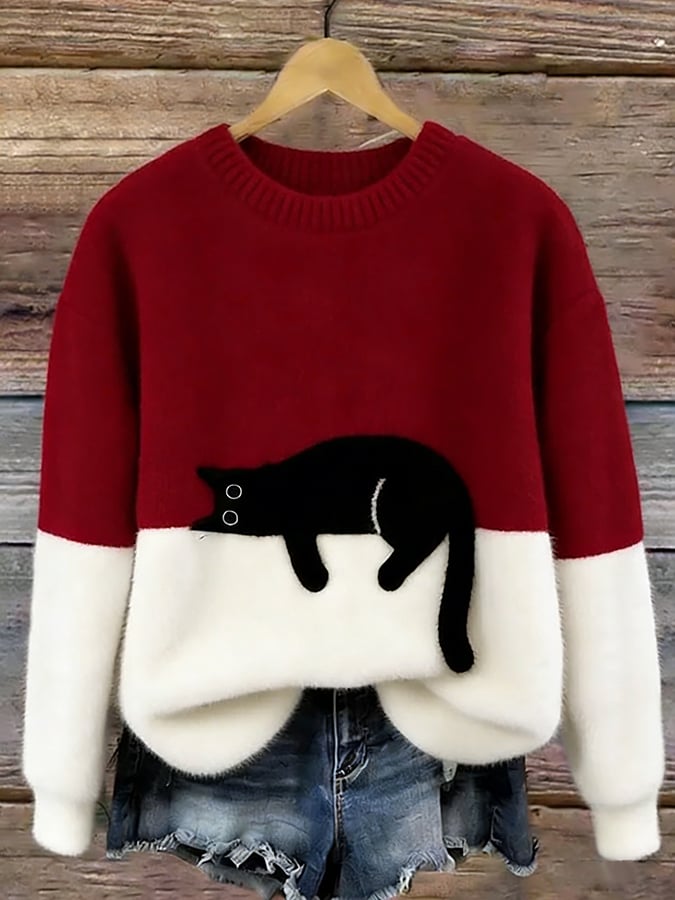 Woman wearing cat design knit sweater with long sleeves