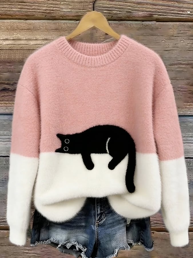 Woman wearing cat design knit sweater with long sleeves