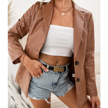 Woman wearing brown PU leather moto jacket blazer