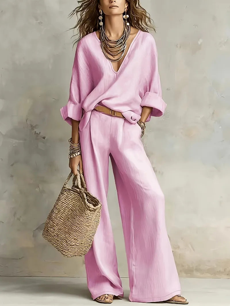 Woman wearing two piece set with wide leg pants