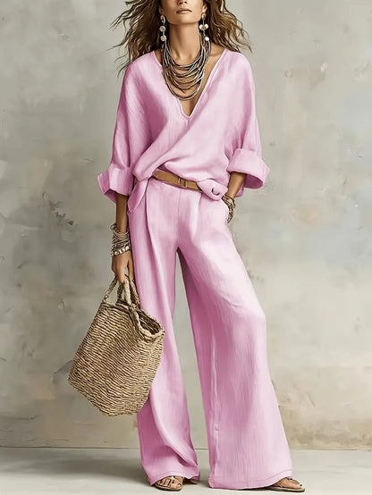 Woman wearing two piece set with wide leg pants