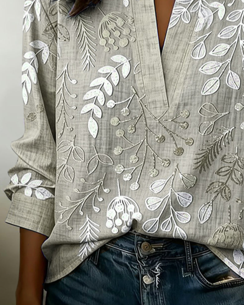 Women's draped V-neck floral blouse