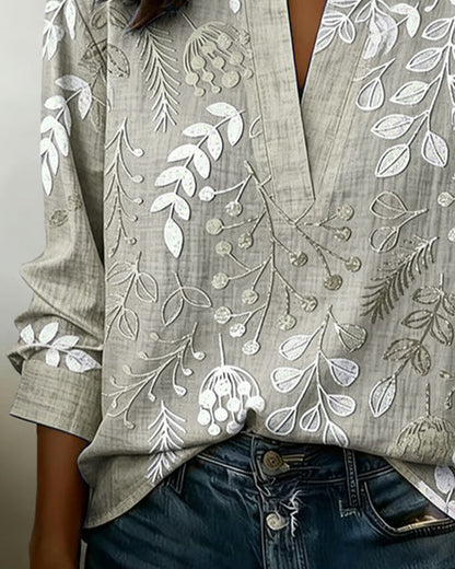 Women's draped V-neck floral blouse