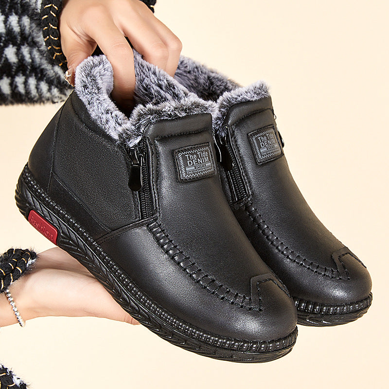Women's black plush lined winter ankle boots with flat heel