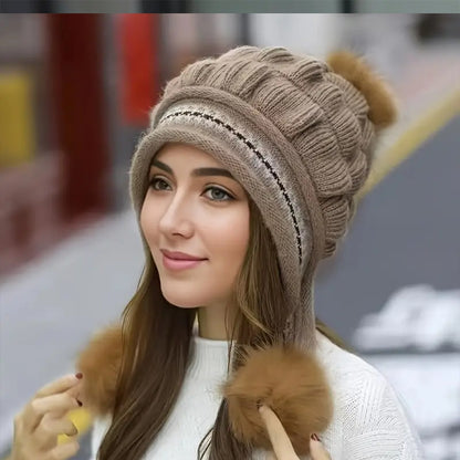 Women's knit beanie with ear flaps and pompom
