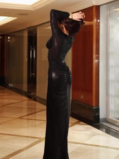 Black long sleeve maxi dress with deep V neckline