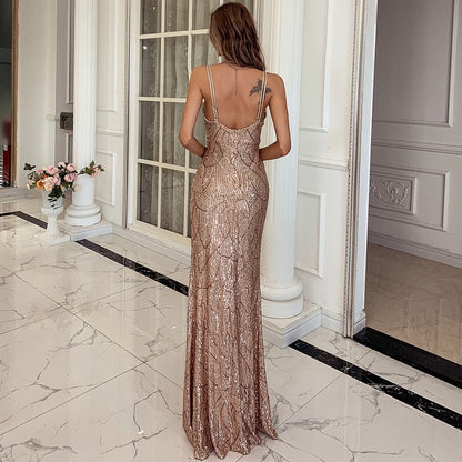 Woman wearing sequin maxi dress with V-neck and spaghetti straps