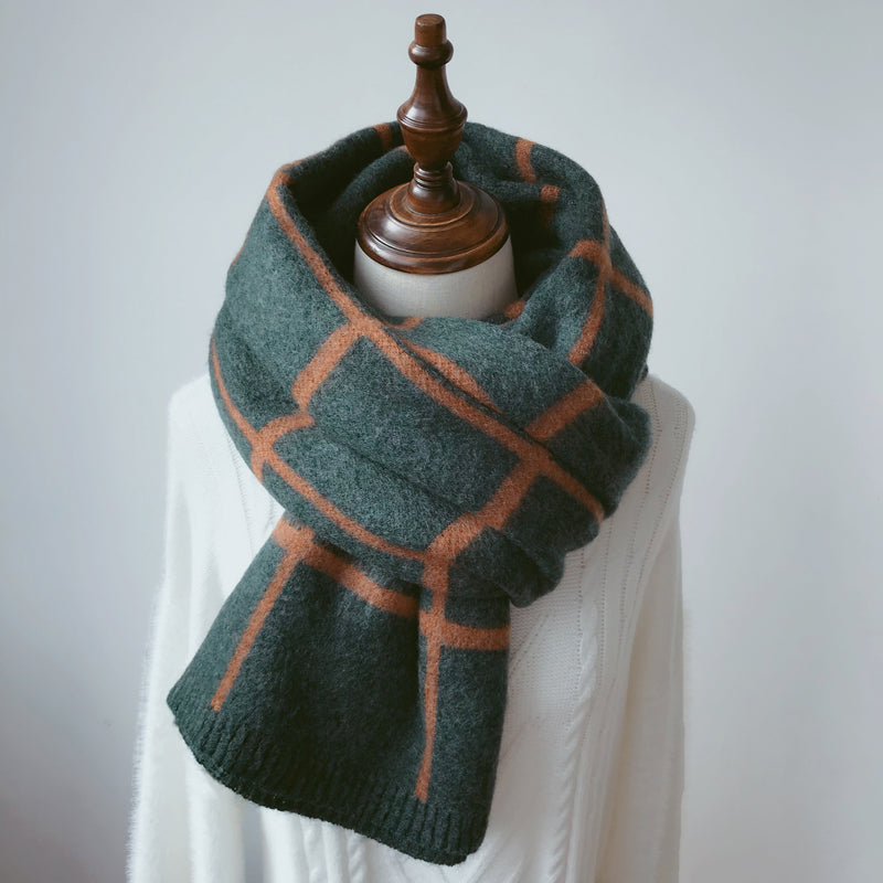Woman wearing long winter scarf in imitation cashmere fabric
