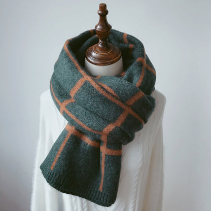 Woman wearing long winter scarf in imitation cashmere fabric