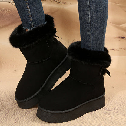 Women's black bow detail mid-top snow boots with plush lining