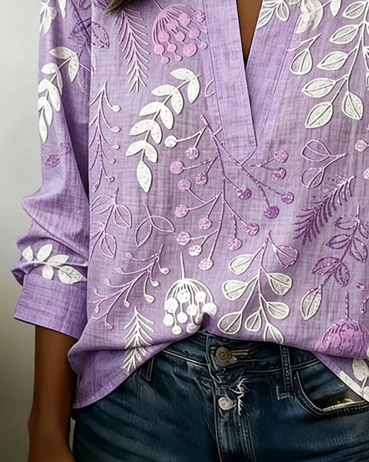 Women's draped V-neck floral blouse