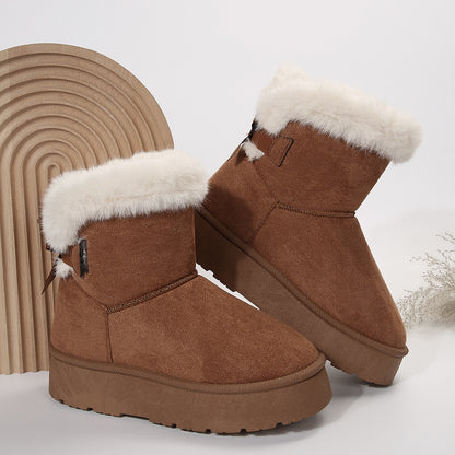 Women's black bow detail mid-top snow boots with plush lining