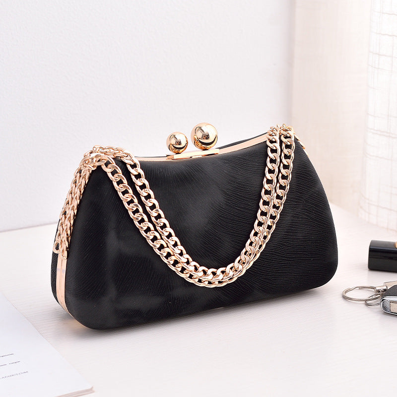 Women's chain shoulder bag with embossed pillow shape