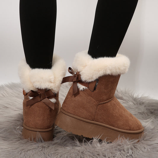 Women's black bow detail mid-top snow boots with plush lining