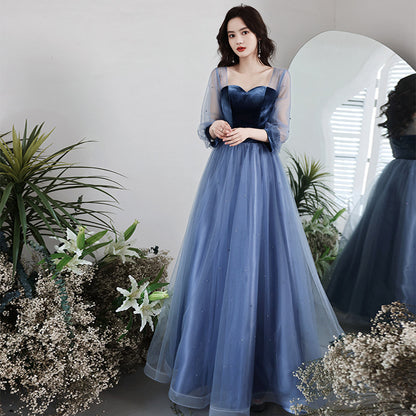 Light blue long A-line party dress with bandage detail