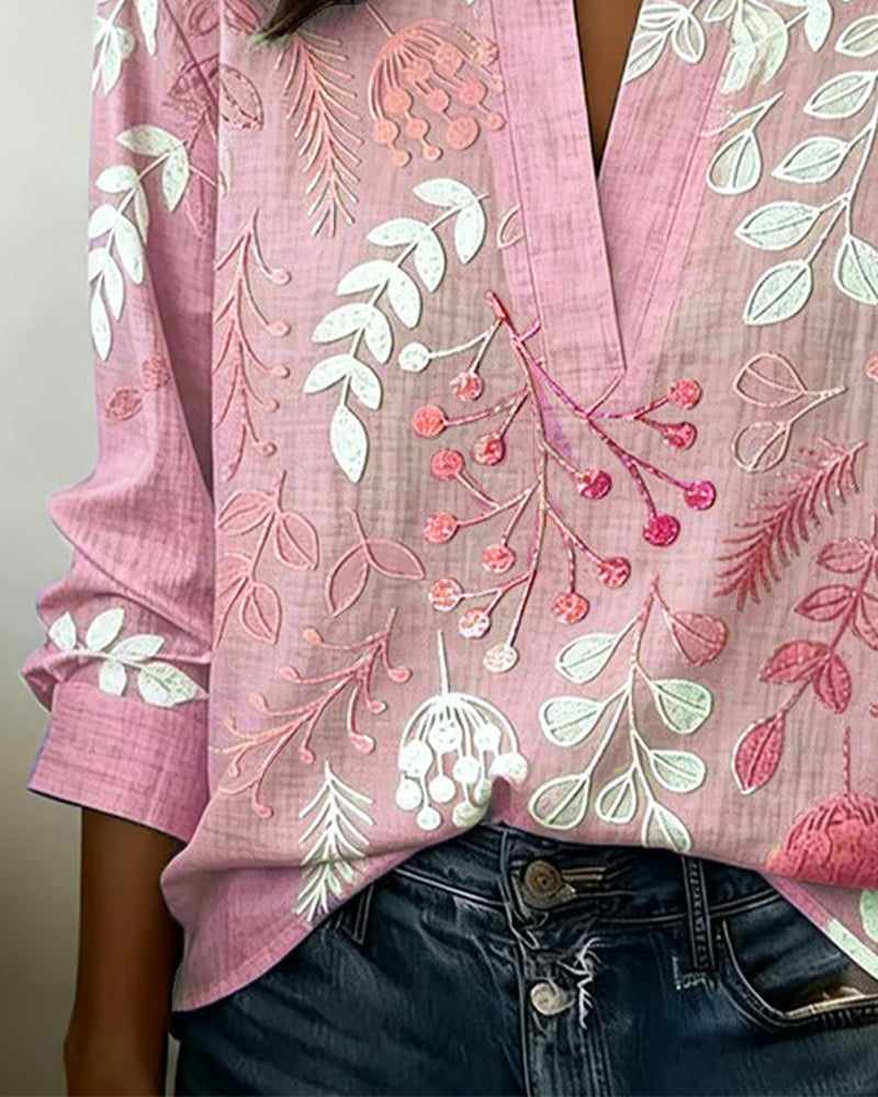 Women's draped V-neck floral blouse