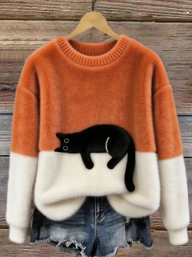 Woman wearing cat design knit sweater with long sleeves