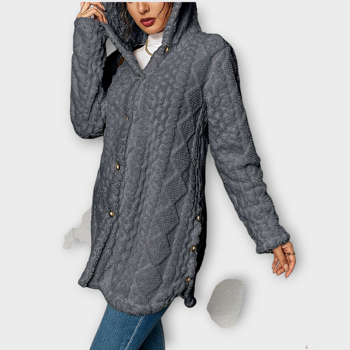 Woman wearing textured hooded winter jacket with relaxed fit