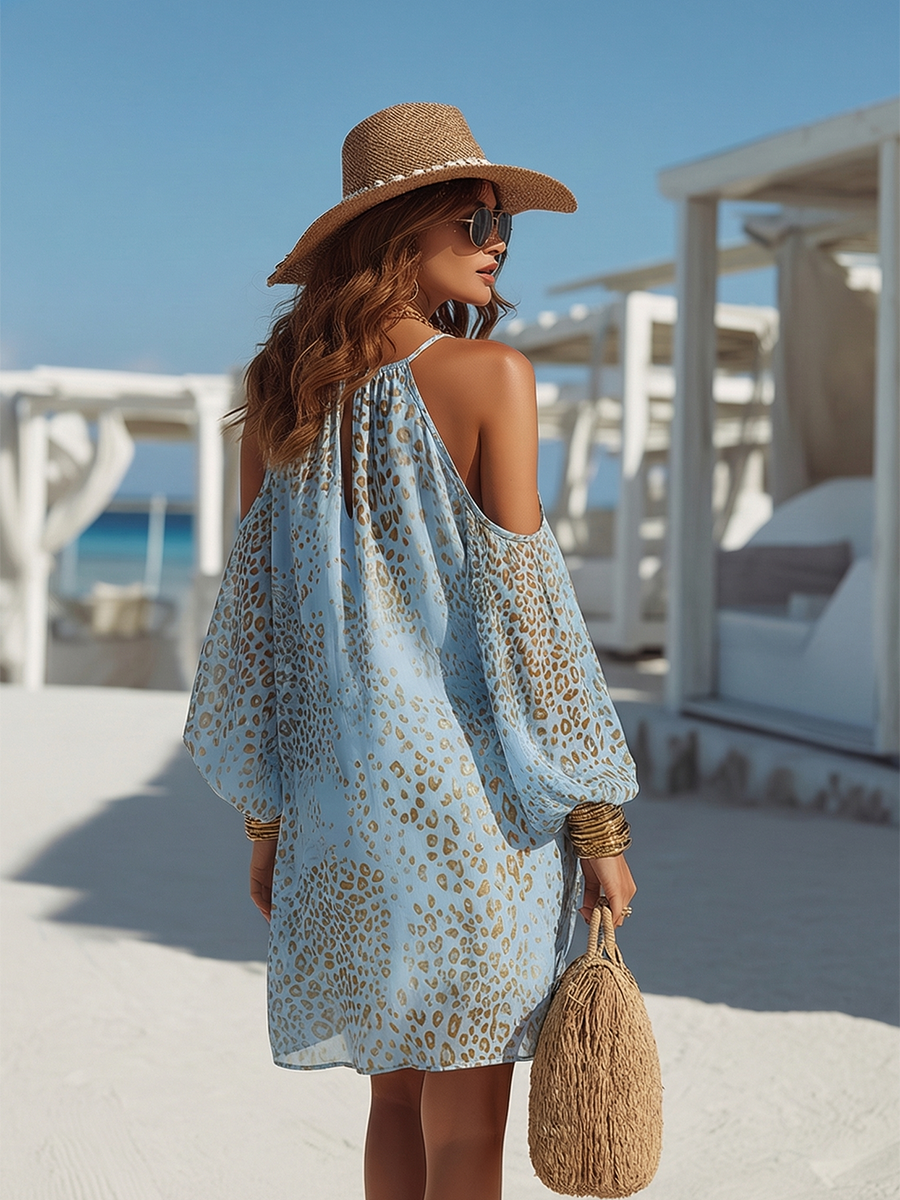 Woman wearing blue off-shoulder leopard print mini dress