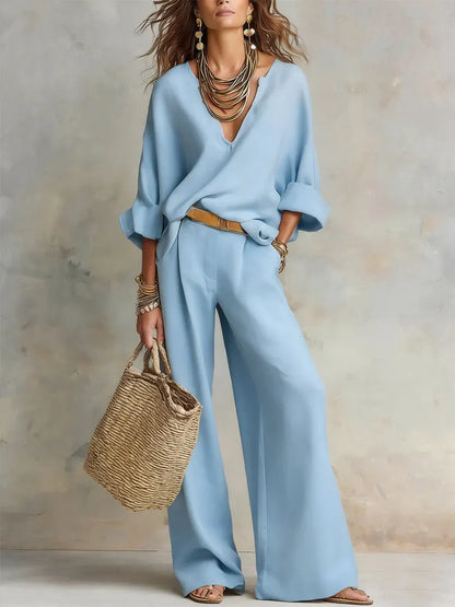 Woman wearing two piece set with wide leg pants