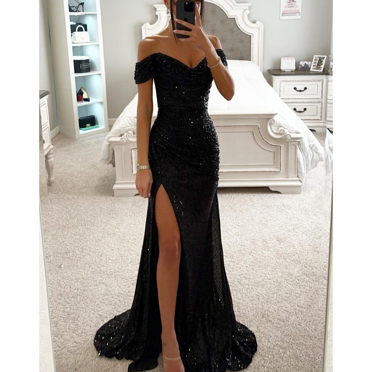Woman in off-shoulder split party dress, solid color