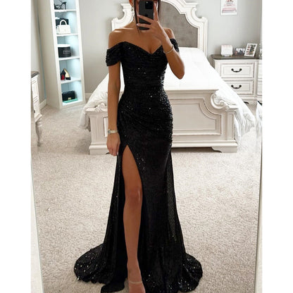 Woman in off-shoulder split party dress, solid color