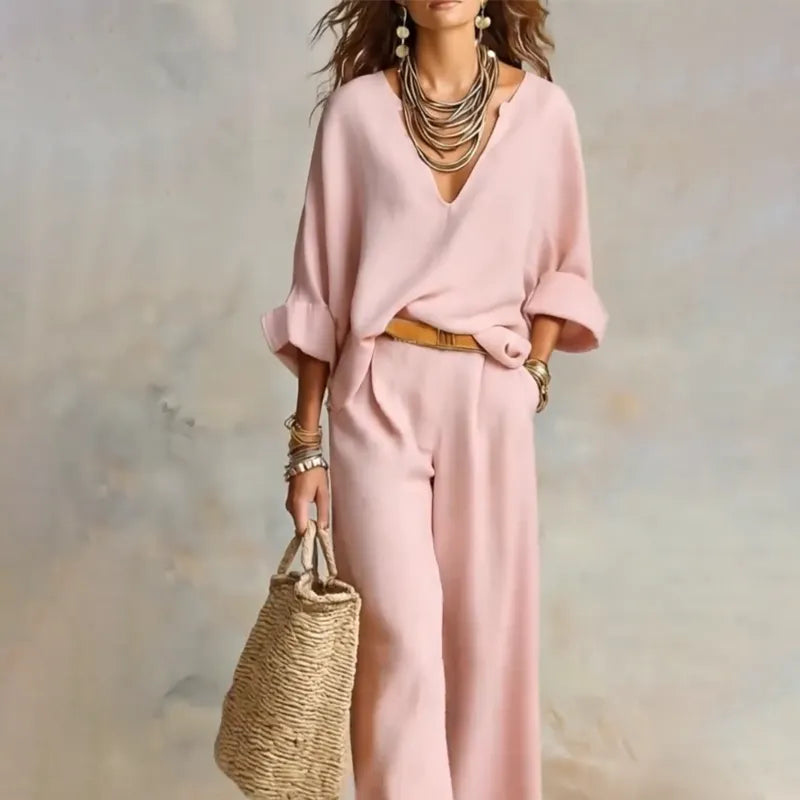 Woman wearing two piece set with wide leg pants