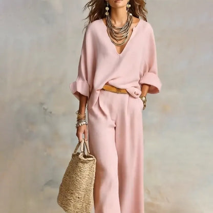 Woman wearing two piece set with wide leg pants