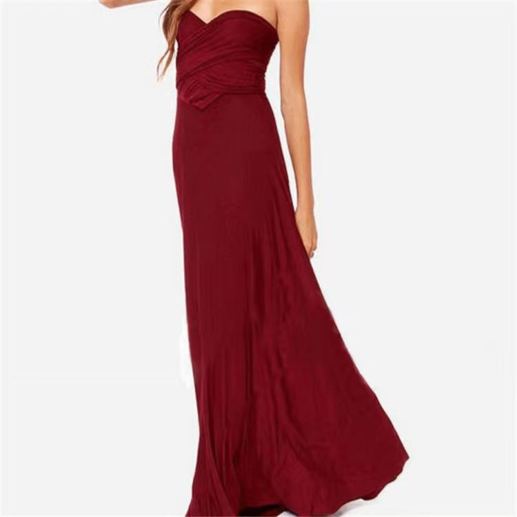 Woman wearing sleeveless V-neck long dress with cross back