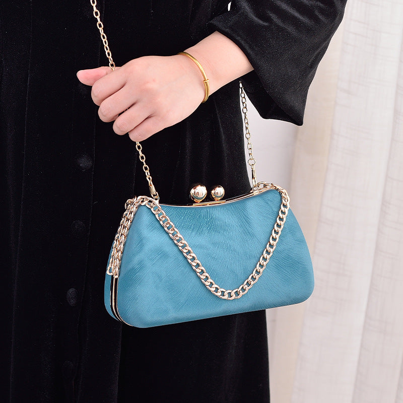 Women's chain shoulder bag with embossed pillow shape