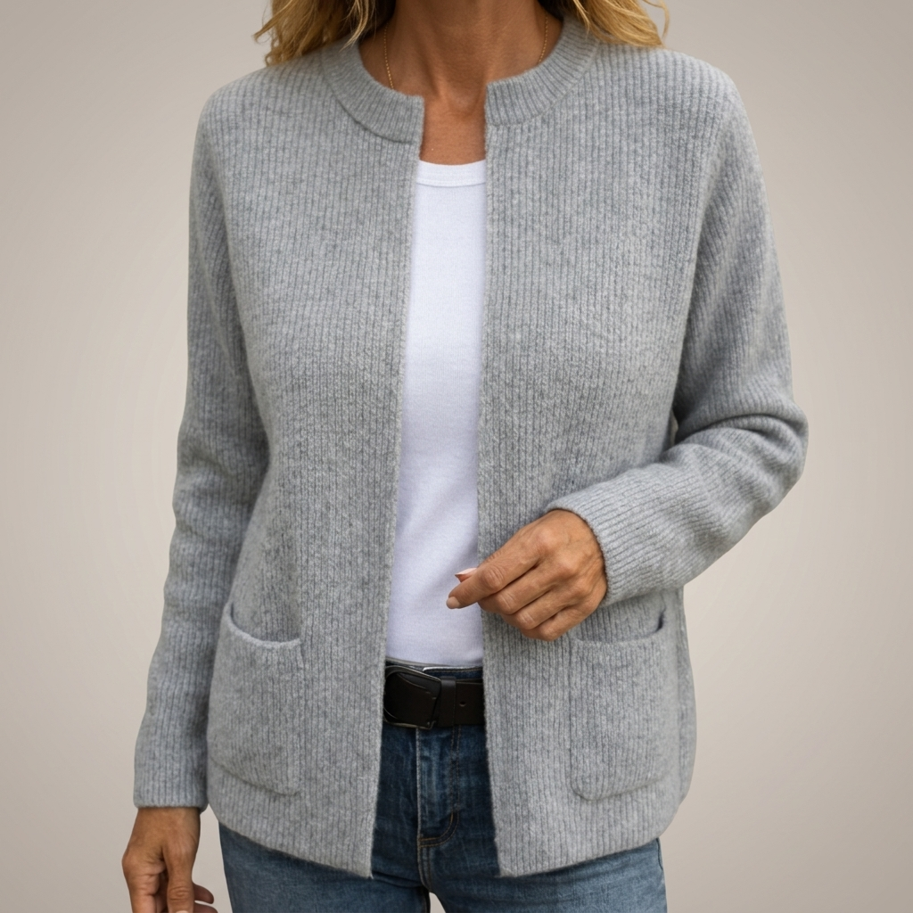 Woman wearing ribbed open front cardigan with front pockets
