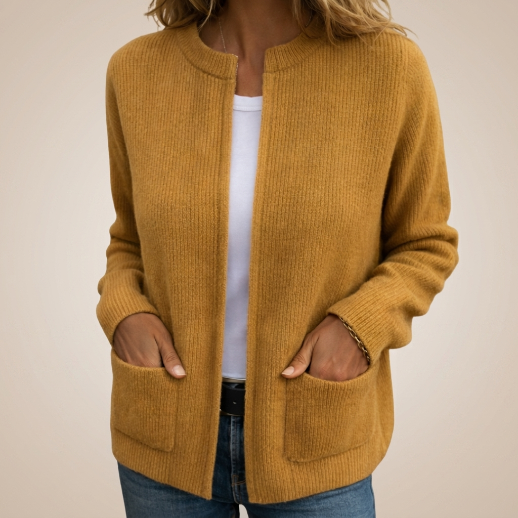 Woman wearing ribbed open front cardigan with front pockets