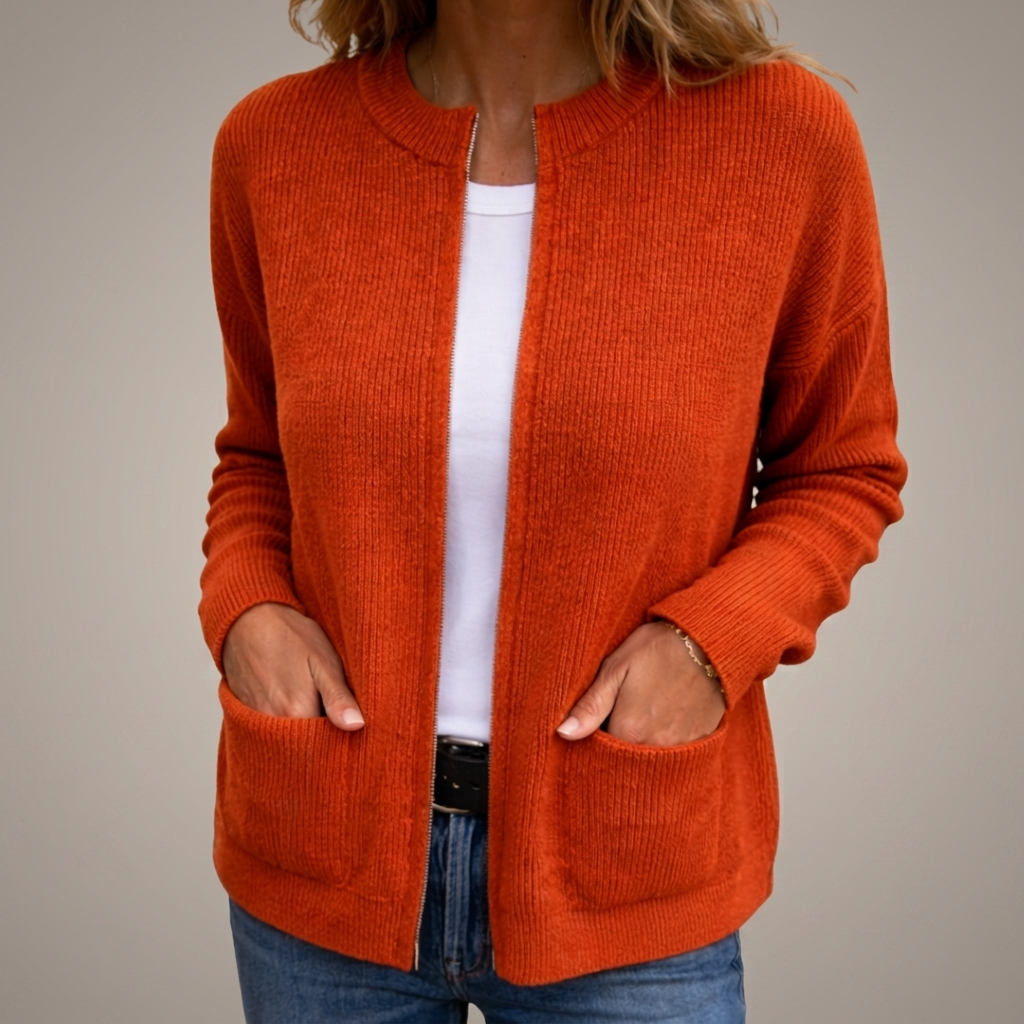 Woman wearing ribbed open front cardigan with front pockets