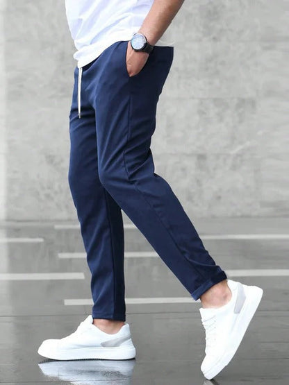 Men's stretch tapered pants with clean hem