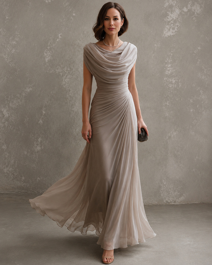 Woman wearing sleeveless draped maxi dress outdoors