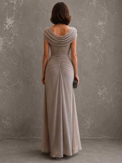 Woman wearing sleeveless draped maxi dress outdoors